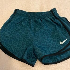 Size small Nike green cheetah print shorts. Brand new, never worn.